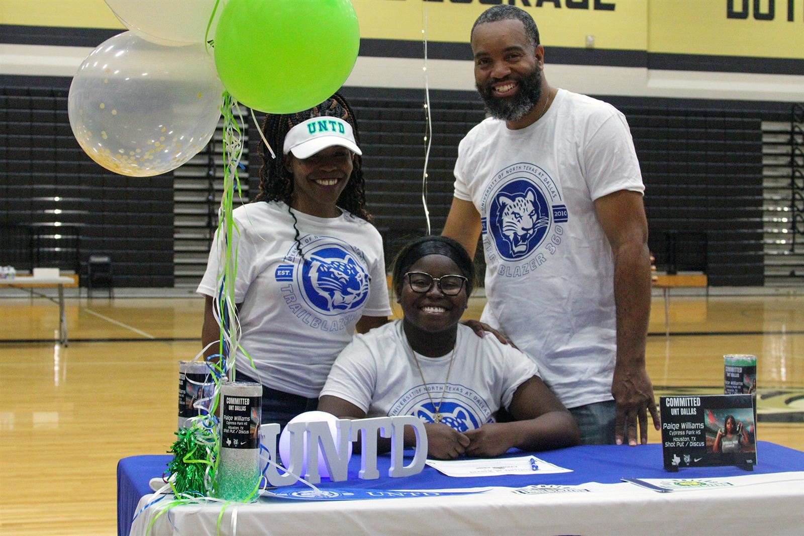Cypress Park High School senior Paige Williams, seated, signed a letter of intent to the University of North Texas at Dallas.